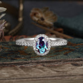 1 Carat Oval Cut Alexandrite Halo Ring with Pave Band